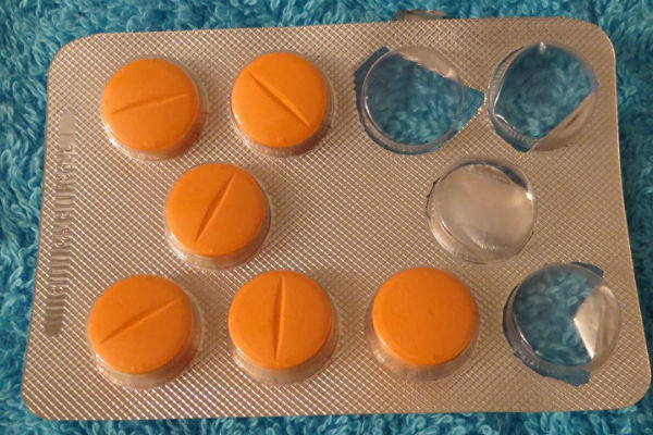 Нолицин: таблетки оранжевого цвета